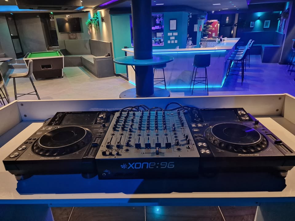 DJ equipment overlooking the Tipsy 303 bar